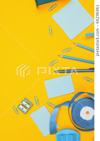 Minimalism, Back to school concept, blue school supplies on yellow background, flat lay copy space 68296861