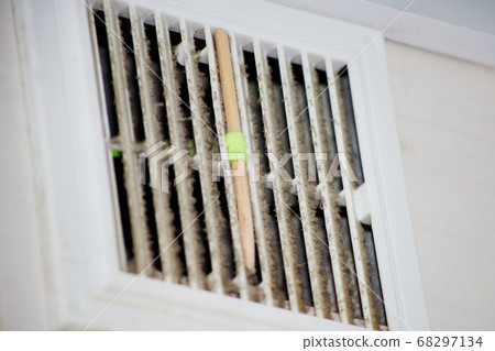 ventilation grill in the dust of dirt in the kitchen, close ventilation grill in the dust of dirt in the kitchen, close 68297134