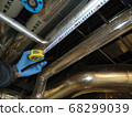 An equipment supplier that measures the dimensions of piping 68299039