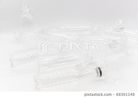 A lot of empty plastic bottles are thrown away A lot of empty plastic bottles are thrown away 68301148