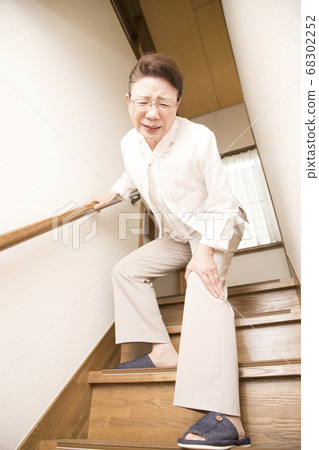 Senior woman with joint pain Senior woman with joint pain 68302252