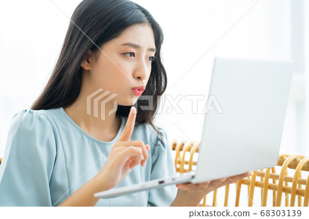 woman working and studying at home woman working and studying at home 68303139