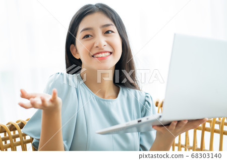 woman working and studying at home woman working and studying at home 68303140