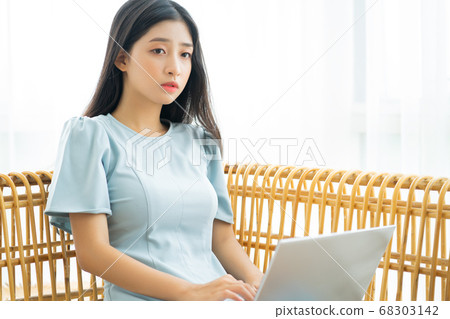 woman working and studying at home woman working and studying at home 68303142