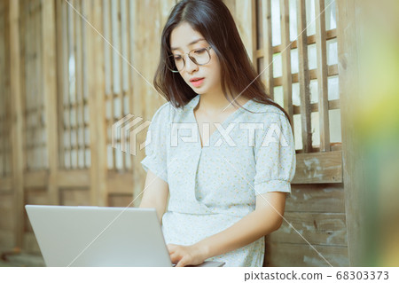 the woman is working the woman is working 68303373