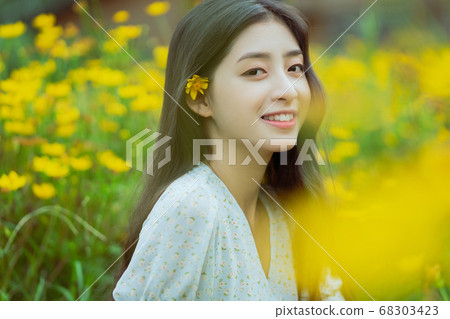 woman in the flower garden woman in the flower garden 68303423