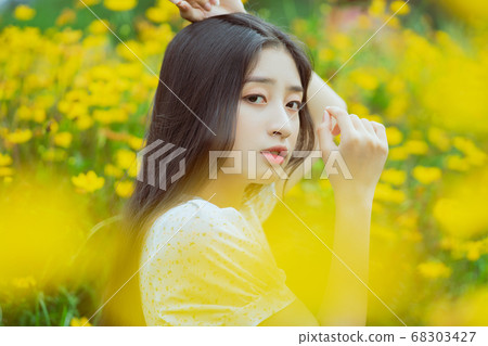 woman in the flower garden woman in the flower garden 68303427