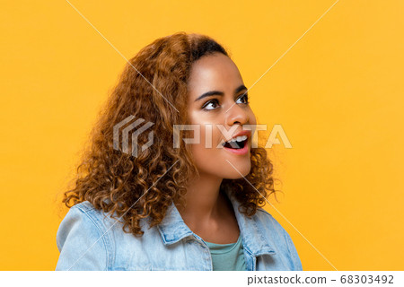 Close up portrait of surprising young beautiful African American woman Close up portrait of surprising young beautiful African American woman 68303492