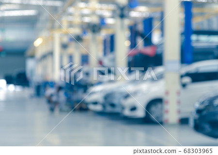 Abstract blur of auto repair service at garage. use for background Abstract blur of auto repair service at garage. use for background 68303965