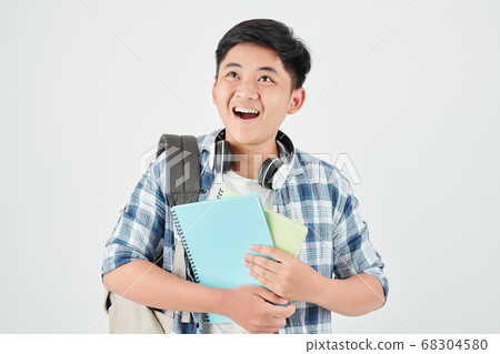 Amazed Asian schoolboy Amazed Asian schoolboy 68304580