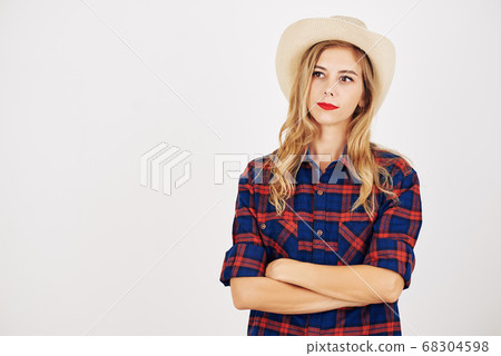 Pensive young woman Pensive young woman 68304598
