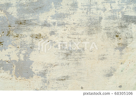 beige texture of the old concrete wall with the remains of paint 68305106