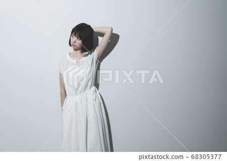 White one piece woman 68305377