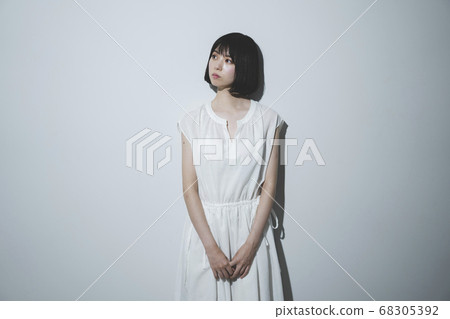 White one piece woman 68305392