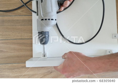 Hand worker doing furniture with professional tools 68305640