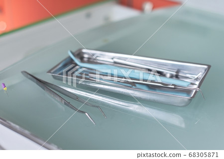 Close-up of dentist doctor work table with special professional tools Close-up of dentist doctor work table with special professional tools 68305871