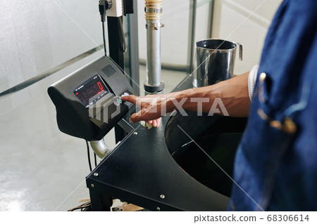 Turning on coffee roaster Turning on coffee roaster 68306614