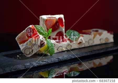 Soft nougat with tropical fruit and berries 68307158