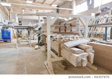 Background carpentry woodworking woodshop, machines and tools, wooden boards 68307870