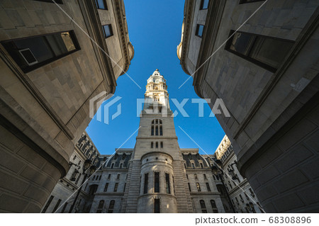 Uprisen angle of Philadelphia city hall with historic building over blue sky background, Pennsylvania, USA or United States of America, Architecture and building, Travel and Tourism concept 68308896
