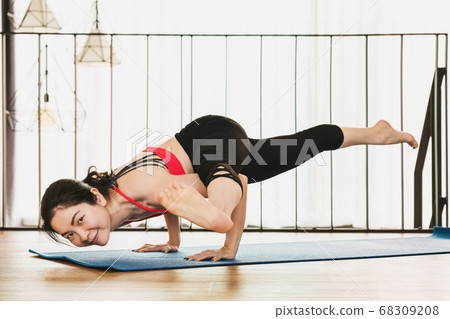Asian woman practicing yoga from home when Covid19 outbreak and lockdown, healthy or Meditation Exercise, yoga workout at home, coronavirus pandemic and quarantine, sports and healthcare concept Asian woman practicing yoga from home when Covid19 outbreak and lockdown, healthy or Meditation Exercise, yoga workout at home, coronavirus pandemic and quarantine, sports and healthcare concept 68309208