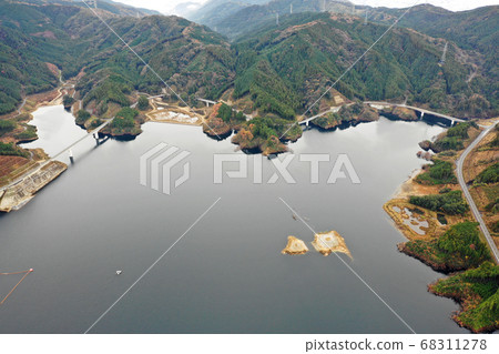 From the sky above Gokayama dam lake 68311278