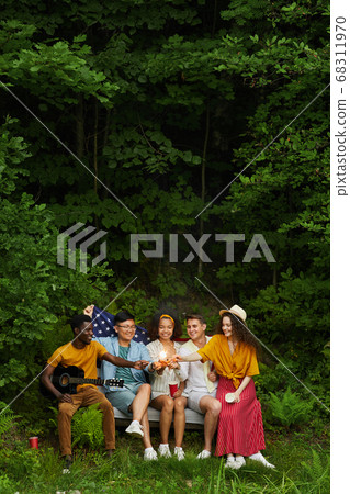 Friends Enjoying Time Outdoors 68311970