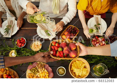Friends at Summer Dinner Table Above View Friends at Summer Dinner Table Above View 68312083