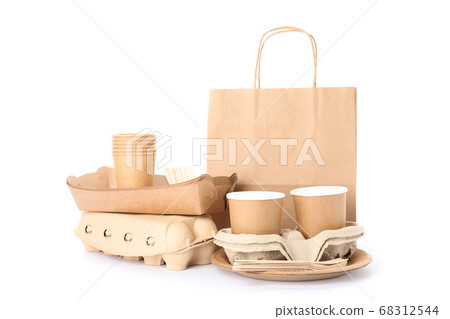 Eco - friendly tableware and paper bag isolated on 68312544