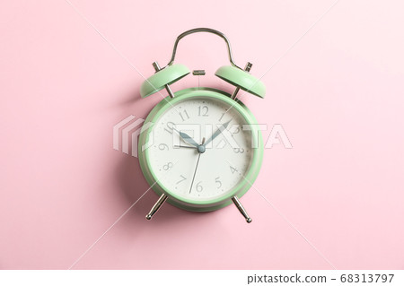 Retro alarm clock on color background, space for Retro alarm clock on color background, space for 68313797