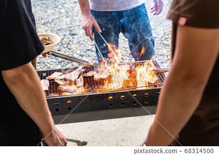 Flame barbecue at summer sunset 68314500