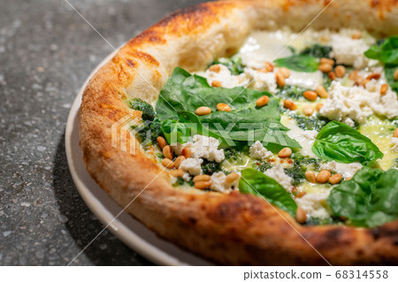 Vegetarian spinach pizza with ricotta cheese and Vegetarian spinach pizza with ricotta cheese and 68314558