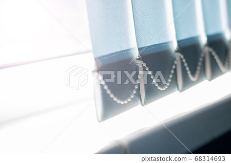 Blue fabric blinds on the window close up Blue fabric blinds on the window close up 68314693