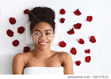 Top view of smiling african girl over white background 68317614