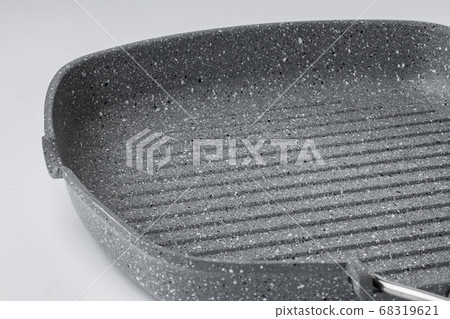 New ceramic non stick frying pan on white background New ceramic non stick frying pan on white background 68319621