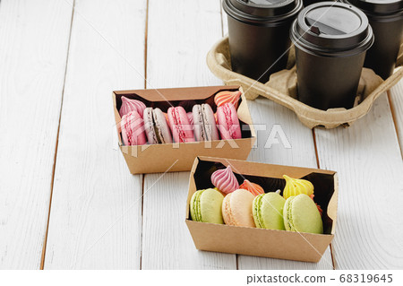 Colorful macaron cookies in a cardboard box Colorful macaron cookies in a cardboard box 68319645