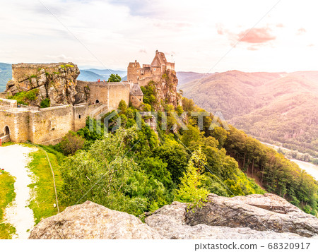 Aggstein Castle ruins above Danube River in Wachau Valley, Austria. Sunset time Aggstein Castle ruins above Danube River in Wachau Valley, Austria. Sunset time 68320917