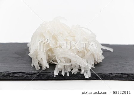 Daikon ken on a black plate 68322911