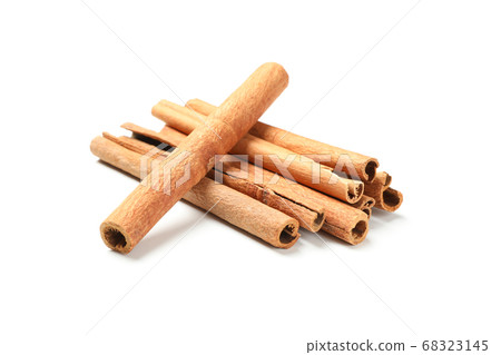 Cinnamon sticks isolated on white background. Cinnamon sticks isolated on white background. 68323145
