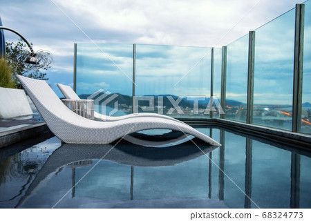 chair bed in luxury swimming pool chair bed in luxury swimming pool 68324773