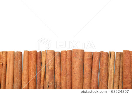 Cinnamon sticks frame isolated on white 68324807