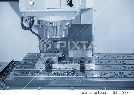 The  CNC  milling machine cutting  the mold parts. 68325725