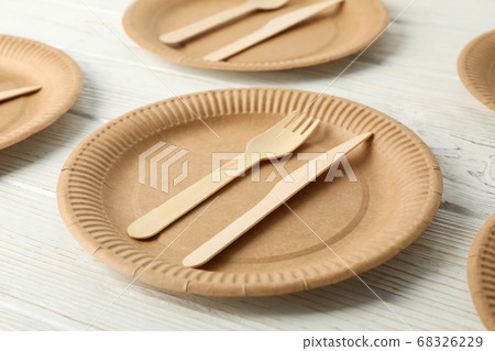 Flat lay with eco - friendly dishware on white Flat lay with eco - friendly dishware on white 68326229