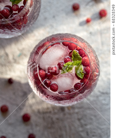 Cocktail with ice and cranberries 68328349