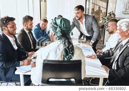 meeting with multiracial business people meeting with multiracial business people 68330802