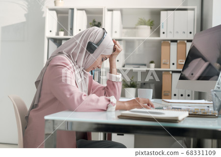 Tired from work in call center Tired from work in call center 68331109