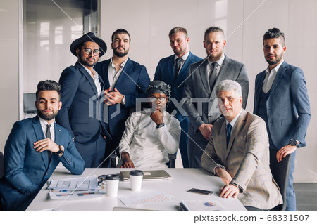 Multiracial group of business team consisting of men only with Executive indoor Multiracial group of business team consisting of men only with Executive indoor 68331507