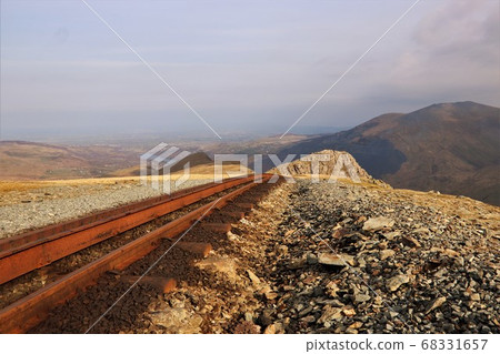 An empty scenic railway on a mountain 68331657