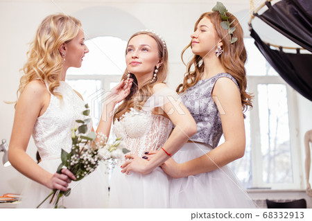 female friends together in wedding salon 68332913