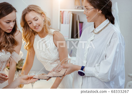woman in white shirt present new shoes 68333267